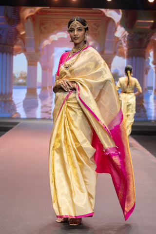 Gold Kanjivaram silk saree inspired by Athiya Shetty with pink border