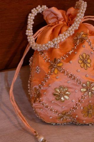 Peach Pearl Potli: Handcrafted Elegance for Celebrations