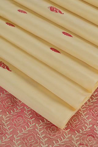 Light Beige Kanjivaram Silk Saree with Red and Gold Buttas