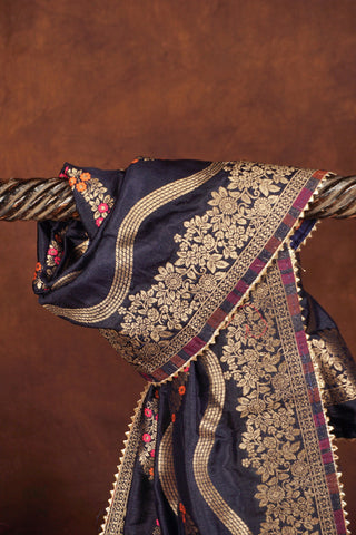 Navy blue silk dupatta with wavy gold zari leheriya stripes, pink and orange meenakari vines and gold kiran lace edging