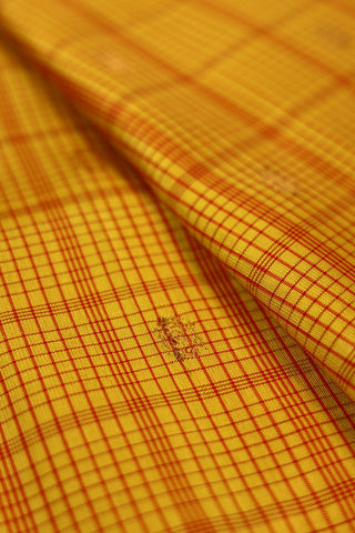 Turmeric Yellow and Red Gadwal Silk Saree with checks and zari border
