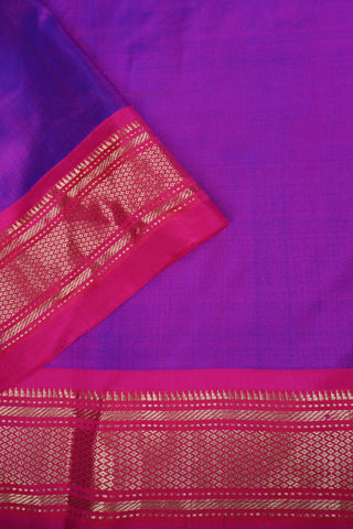 Royal purple Paithani saree with magenta zari border, gold star buttis and a geometric pallu of peacocks