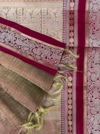 Golden olive green and bronze shot silk cotton saree with maroon border woven with elephant and peacock motifs