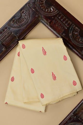 Light Beige Kanjivaram Silk Saree with Red and Gold Buttas