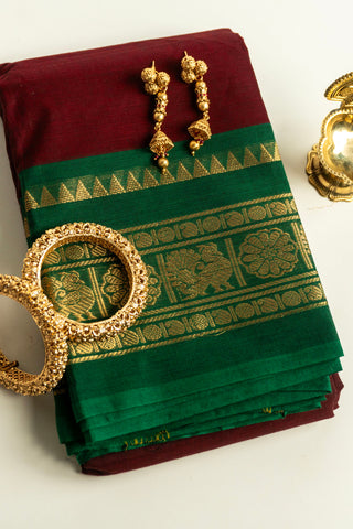 Deep Maroon Chettinad Cotton Saree with Forest Green and Gold Peacock Border