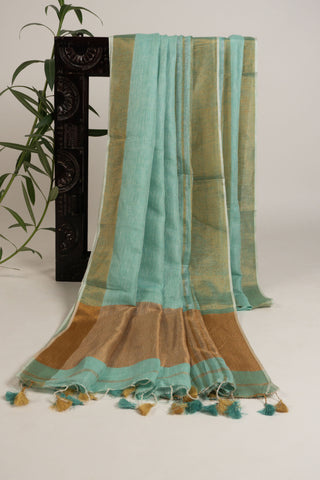 Aqua green handloom linen saree with gold zari