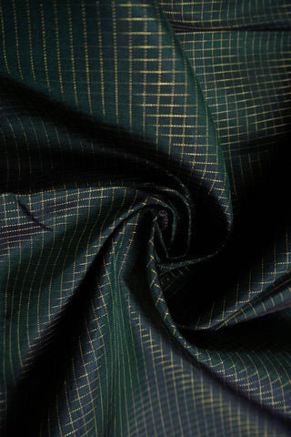 Deep bottle green Kanjivaram silk saree with gold checks and a rani pink elephant and peacock border
