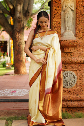 Off White Kanjivaram Pure Silk Saree with Paisley Floral Motifs Gold Zari Maroon Border and Full Brocade Pallu