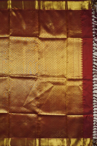 Off white Kanjivaram silk saree with gold zari paisley motifs and a deep maroon full brocade pallu
