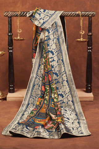 Multicolor Pichwai printed Dola silk dupatta with lotus ponds and kamdhenu motifs, royal blue silver zari floral border