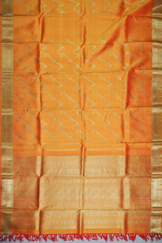Copper orange shot silk Kanjivaram saree with red Meenakari peacock vine motifs and gold zari brocade border