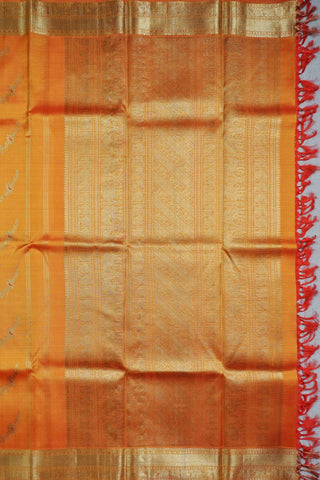 Copper orange shot silk Kanjivaram saree with red Meenakari peacock vine motifs and gold zari brocade border