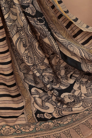 Monochrome Kalamkari silk saree with golden border