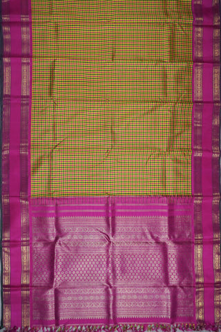 Yellow, green and rani pink micro check Kanjivaram silk cotton saree with a rani pink gold zari border