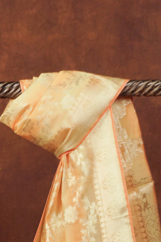 Pastel yellow art Banarasi silk dupatta with silver zari floral vine jaal, peach selvage and white-peach tassels