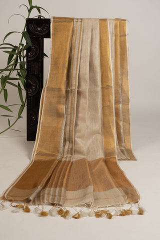 Off-white linen saree with golden pallu