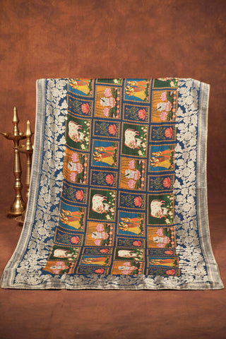 Multicolor Pichwai printed Dola silk dupatta with lotus ponds and kamdhenu motifs, royal blue silver zari floral border