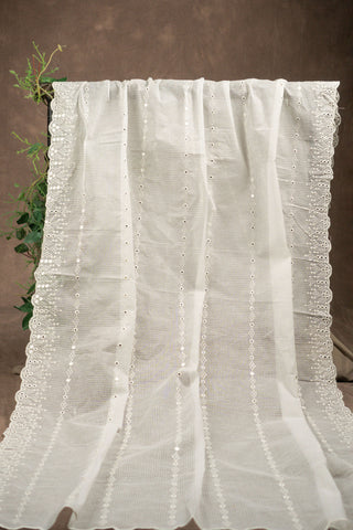 White Kota Doria dupatta with cutwork scalloped border and mirror embroidery