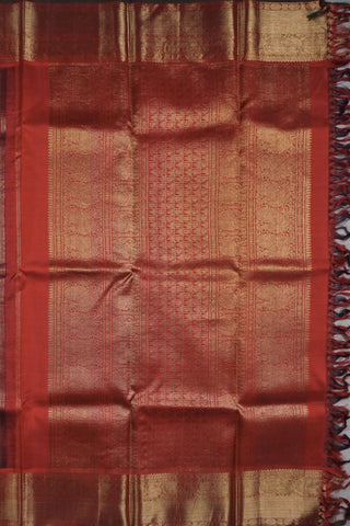 Dull maroon shot silk Kanjivaram saree with gold zari peacock border and crimson brocade pallu