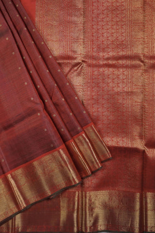 Dull maroon shot silk Kanjivaram saree with gold zari peacock border and crimson brocade pallu