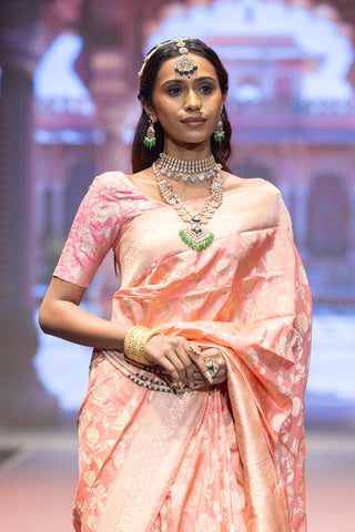 Peach handloom Banarasi silk saree with zari border and rich pallu