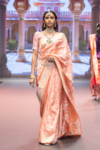 Peach handloom Banarasi silk saree with zari border and rich pallu