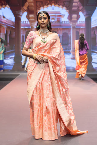 Peach handloom Banarasi silk saree with zari border and rich pallu