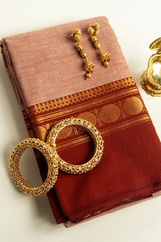 Nude Pink Chettinad Cotton Saree with Rust Red and Golden Coin Border