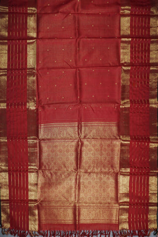 Ruby red Kanjivaram silk saree with gold micro checks, floral buttas and a bottle green selvedge border