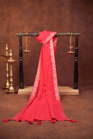 Rani pink jacquard dupatta with woven florals, sequin work, silver zari floral borders and beaded tassels