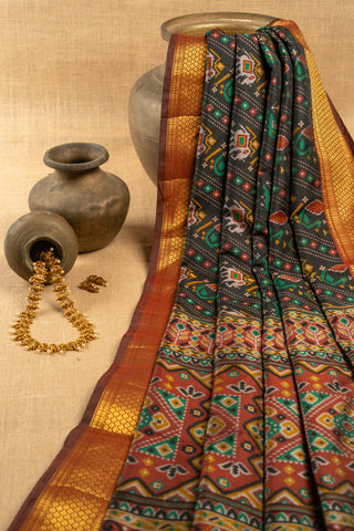 Black Art Silk Patola Print Saree with geometric Patola motifs