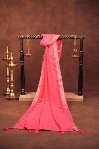 Fuchsia pink jacquard dupatta with sequin embellishments, silver Banarasi zari floral borders and beaded tassels