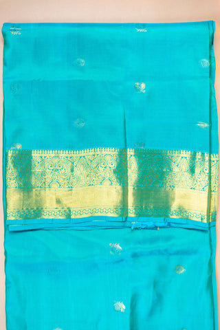 Turquoise blue Kanjivaram silk saree with gold zari border and pallu