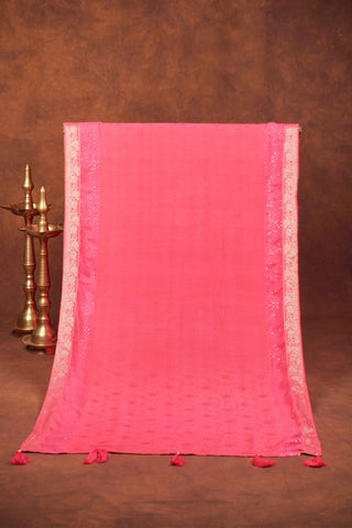 Fuchsia pink jacquard dupatta with sequin embellishments, silver Banarasi zari floral borders and beaded tassels