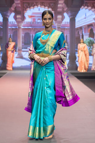 Turquoise blue Kanjivaram silk saree with gold zari border and pallu