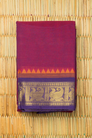 Rani pink and purple dhoop-chaon Chettinad cotton saree with gold zari peacock border motif