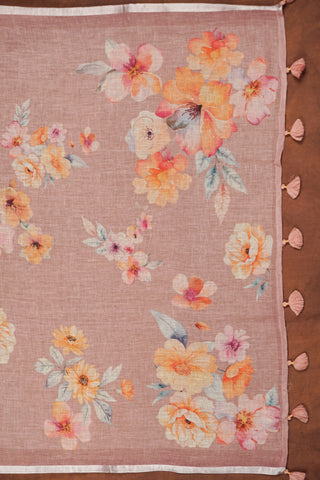Lilac linen saree with watercolour-style floral prints in peach, yellow and blush, silver zari selvedge and tassels