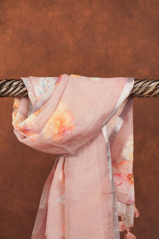 Lilac linen saree with watercolour-style floral prints in peach, yellow and blush, silver zari selvedge and tassels