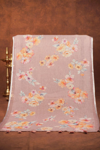 Lilac linen saree with watercolour-style floral prints in peach, yellow and blush, silver zari selvedge and tassels