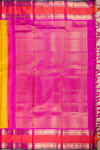 Mustard and rani pink handloom Kanjivaram silk saree with zari border