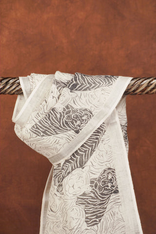 White linen dupatta with black tiger sketch print, layered line art backdrop, silver zari selvage and white tassels