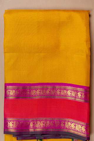 Mustard and rani pink handloom Kanjivaram silk saree with zari border
