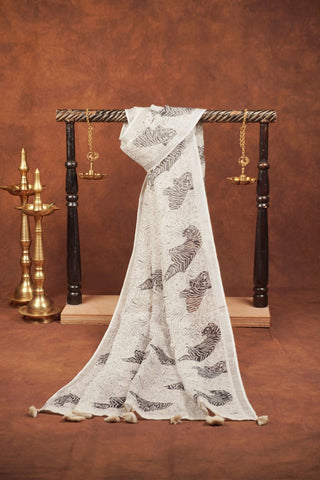 White linen dupatta with black tiger sketch print, layered line art backdrop, silver zari selvage and white tassels