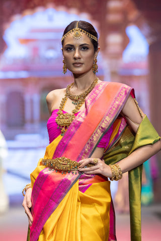 Mustard and rani pink handloom Kanjivaram silk saree with zari border