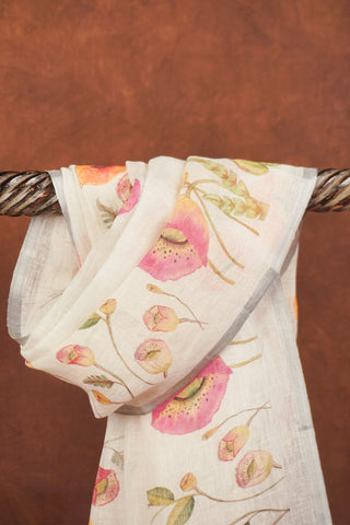 White linen dupatta with pink and peach poppy floral borders, green foliage, silver zari selvage and white tassels