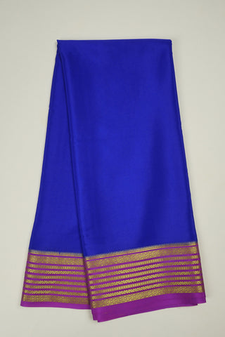 royal blue crepe silk saree with magenta zari pallu