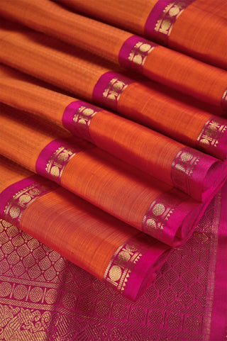 Radiant Orange Kanjivaram Silk Saree with Rani Pink Border and Gold Zari Work