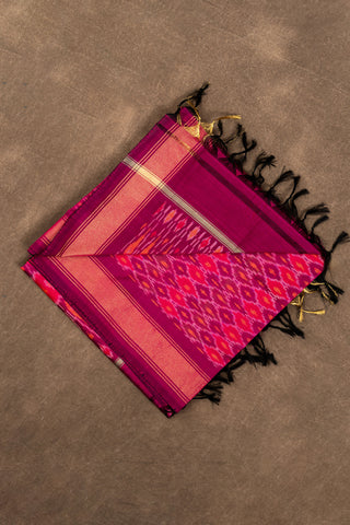 Magenta cotton silk Ikat dupatta with diamond motifs and tassels