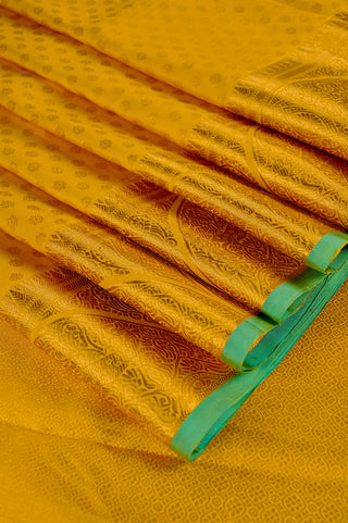 Radiant Yellow Kanjivaram Silk Saree with Green Trim and Self-Weave Motifs
