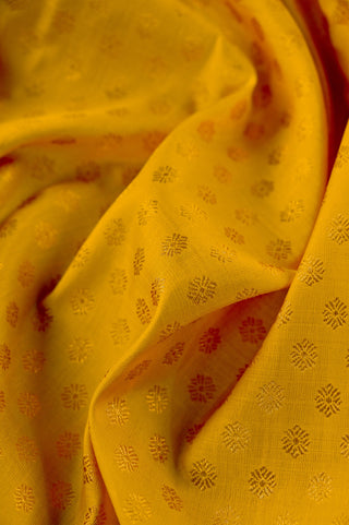 Radiant Yellow Kanjivaram Silk Saree with Green Trim and Self-Weave Motifs